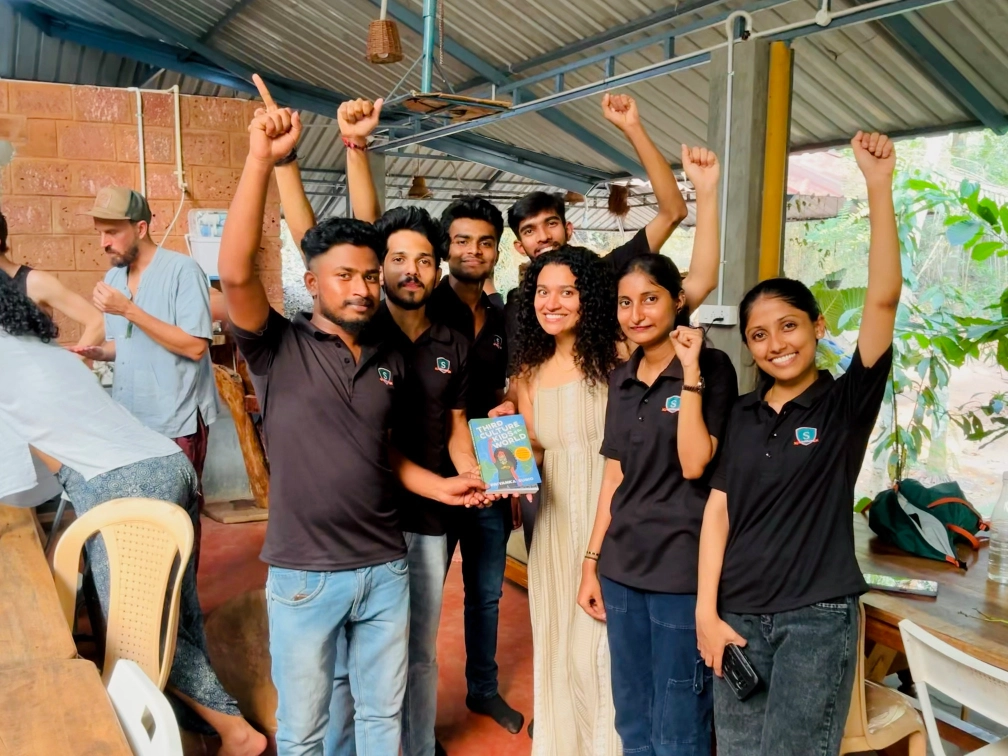 Travel activists and community members celebrating together